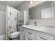 Bathroom with white vanity, modern sink, and tub shower with patterned curtain at 24005 High Meadow Dr, Golden, CO 80401