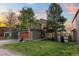 Lovely home featuring a basketball hoop, mature trees, and a well-maintained front yard in a tranquil setting at 24005 High Meadow Dr, Golden, CO 80401