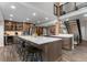 Spacious kitchen with large island, counter seating, and stainless steel appliances at 24005 High Meadow Dr, Golden, CO 80401
