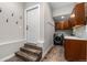 Entryway and Laundry Room with grey walls and wood look floors at 24005 High Meadow Dr, Golden, CO 80401