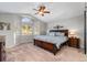 Spacious main bedroom with a fan and large windows with a view at 24005 High Meadow Dr, Golden, CO 80401