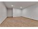 Spacious basement with neutral carpet and white walls ready to be personalized at 12317 Fillmore Ct, Thornton, CO 80241