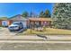 Charming single-story brick home featuring a well-maintained front yard and an attached two-car garage at 12317 Fillmore Ct, Thornton, CO 80241