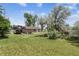 Sprawling backyard with detached garage and parked RV, offering ample space and functionality at 1808 Riverview Dr, Berthoud, CO 80513