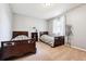 Spare bedroom with carpet, natural light and two twin beds at 1808 Riverview Dr, Berthoud, CO 80513