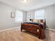 Bright bedroom with neutral paint, carpet and natural light from the windows at 1808 Riverview Dr, Berthoud, CO 80513