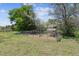 Idyllic chicken coop and run sit in a sun-drenched yard, perfect for hobby farmers and animal lovers alike at 1808 Riverview Dr, Berthoud, CO 80513
