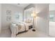 Cozy bedroom with a built-in Murphy bed, soft textures, and light, neutral colors, perfect for relaxation at 11364 Xavier Dr # 205, Westminster, CO 80031