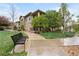 Well-maintained townhome community with landscaped grounds, walking paths, and a relaxing bench at 11364 Xavier Dr # 205, Westminster, CO 80031