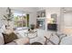 Charming living room featuring a fireplace, balcony, and stylish decor at 11364 Xavier Dr # 205, Westminster, CO 80031