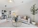 Bright and airy living room with modern furniture and a view into the dining area at 11364 Xavier Dr # 205, Westminster, CO 80031