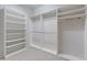 Spacious walk-in closet with ample shelving and hanging rods, perfect for organization at 11364 Xavier Dr # 205, Westminster, CO 80031