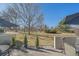 Scenic backyard showcasing a well-manicured lawn, a charming patio, and mature trees offering ample shade at 9200 E Cherry Creek South Dr # 10, Denver, CO 80231