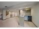 Finished basement featuring a stylish bar area with a mini-fridge and wine rack for entertaining guests at 9200 E Cherry Creek South Dr # 10, Denver, CO 80231