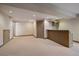 Finished basement with bar area with overhead wine rack, for extra entertaining space at 9200 E Cherry Creek South Dr # 10, Denver, CO 80231