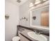 Clean and simple bathroom with a single sink and modern fixtures at 9200 E Cherry Creek South Dr # 10, Denver, CO 80231