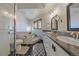 Modern bathroom with double sinks, sleek fixtures, and a separate tub and shower at 9200 E Cherry Creek South Dr # 10, Denver, CO 80231