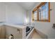 Cozy bathroom featuring a unique stained glass window, and relaxing soaking tub, perfect for unwinding at 9200 E Cherry Creek South Dr # 10, Denver, CO 80231