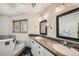 Elegant bathroom with double vanity and a large shower at 9200 E Cherry Creek South Dr # 10, Denver, CO 80231