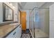 Modern bathroom with sleek fixtures, a spacious glass-enclosed shower, and a stylish vanity at 9200 E Cherry Creek South Dr # 10, Denver, CO 80231