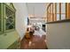 Inviting entryway with hardwood floors leads to a cozy living room with a staircase to the right at 9200 E Cherry Creek South Dr # 10, Denver, CO 80231