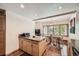 Modern kitchen with wood cabinets, granite countertops and island at 9200 E Cherry Creek South Dr # 10, Denver, CO 80231