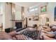 Living room features a fireplace and hardwood floors, offering a warm and inviting atmosphere at 9200 E Cherry Creek South Dr # 10, Denver, CO 80231