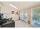 Home office with built-in shelving and exterior access at 9200 E Cherry Creek South Dr # 10, Denver, CO 80231