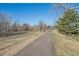 Scenic walking path surrounded by nature, offering residents a tranquil space for exercise and relaxation at 9200 E Cherry Creek South Dr # 10, Denver, CO 80231