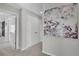 Upstairs hallway with neutral walls and carpet at 27891 E 7Th Ave, Aurora, CO 80018