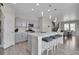 Modern kitchen with island, stainless steel appliances, and gray cabinets at 27891 E 7Th Ave, Aurora, CO 80018