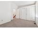Spacious bedroom featuring plush carpeting, and multiple closets for ample storage at 16104 E Alaska Pl # D, Aurora, CO 80017
