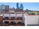 Rooftop view of condos and city skyline with numerous tall buildings in the background at 1435 Wazee St # 504, Denver, CO 80202