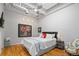 Bright bedroom boasts stylish decor, modern industrial ceilings, and ample natural light at 1435 Wazee St # 504, Denver, CO 80202
