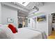 Bright bedroom featuring a skylight, modern industrial design, and a dedicated workspace at 1435 Wazee St # 504, Denver, CO 80202