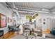 Spacious living room with hardwood floors, modern furnishings and open floor plan to the kitchen at 1435 Wazee St # 504, Denver, CO 80202