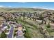Panoramic aerial view of the community with lush greenery and mountain scenery at 2140 S Coors Cir, Lakewood, CO 80228