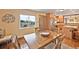 Dining area near the kitchen featuring a wooden table and scenic outdoor views at 2140 S Coors Cir, Lakewood, CO 80228