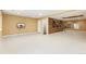 Spacious basement with recessed lighting and a mounted tv at 2112 Springs Pl, Longmont, CO 80504