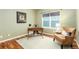 Home office featuring a desk, an armchair, and a window, creating an efficient workspace at 2112 Springs Pl, Longmont, CO 80504