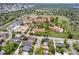 Aerial view showcasing city neighborhood, tree-lined streets and well-maintained properties at 1016 S Cook St, Denver, CO 80209