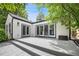 Spacious patio area with seamless indoor-outdoor transition through sliding glass doors, perfect for entertaining at 1016 S Cook St, Denver, CO 80209