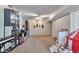 Finished basement features neutral carpet, recessed lighting, and ample storage at 3792 S Pitkin Ct, Aurora, CO 80013