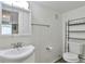 Small, plain bathroom with a sink, toilet, mirror, and minimal decor at 3792 S Pitkin Ct, Aurora, CO 80013