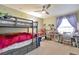 Bedroom with bunk beds and ceiling fan at 3792 S Pitkin Ct, Aurora, CO 80013