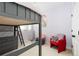 Cozy bedroom featuring a grey loft bed, fun decor, and carpeted floors at 8768 E 54Th Pl, Denver, CO 80238