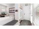 Inviting entryway with a bench, storage, and access to the living room with a wall decor at 8768 E 54Th Pl, Denver, CO 80238