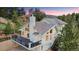 Architecturally striking home featuring a wall of windows and deck, perfect for enjoying scenic views at 9001 Eastridge Rd, Golden, CO 80403