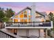 Stunning home with large windows, balcony, and two-car garage offering comfort and convenience at 9001 Eastridge Rd, Golden, CO 80403