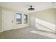 Bright and airy bedroom featuring neutral walls, plush carpeting, and windows bringing in natural light at 1559 N Hooker St, Denver, CO 80204
